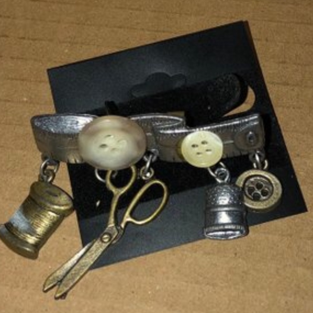 Vintage seamstress Jonette jewelry style brooch.